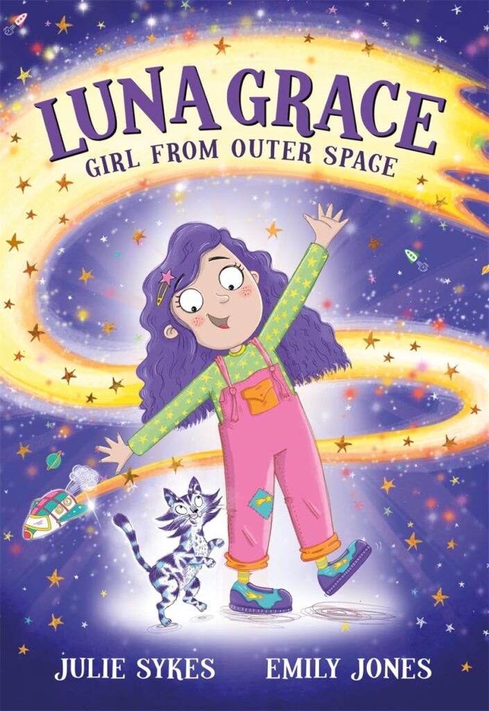 Book Cover of Luna Grace Girl From Outer Space Featuring Luna Grace who has purple hair and is wearing a green top with pink overalls. 